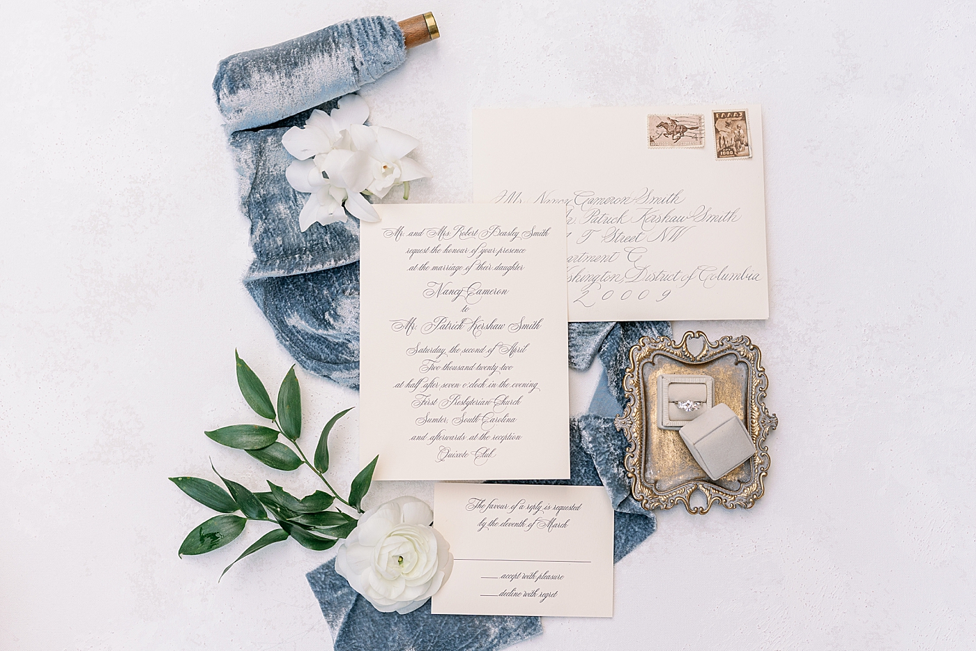 Wedding invitation suite styled with blue velvet ribbon | Photo by Annie Laura Photography