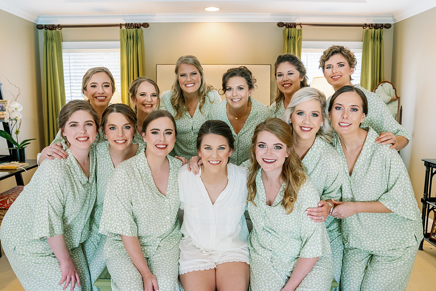 Bride with her bridal party all in pajamas | Photo by Annie Laura Photography