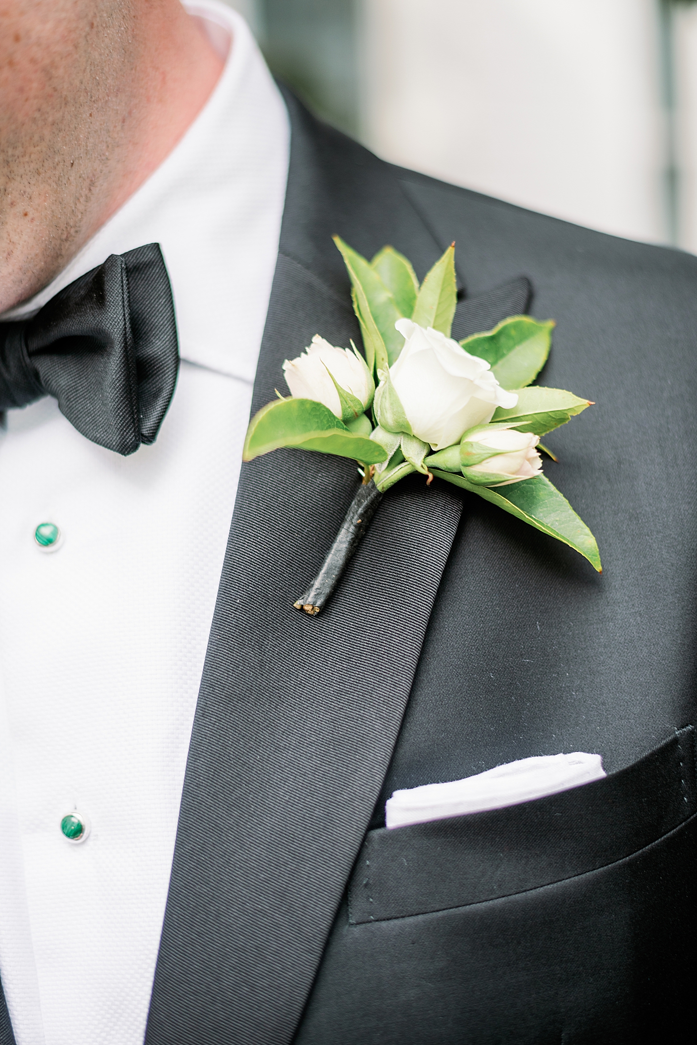 Groom's wedding flowers | Photo by Annie Laura Photography