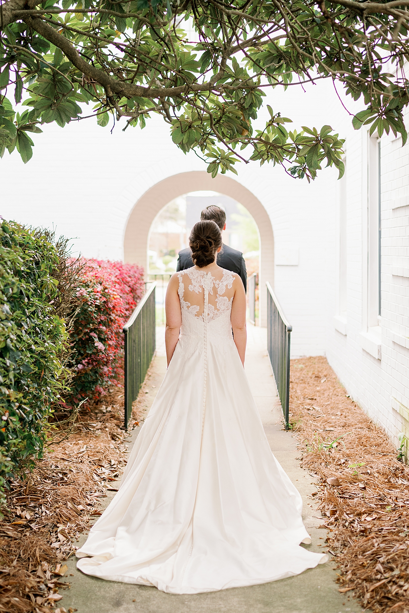 Bride walking toward groom for their first look | Photo by Annie Laura Photography