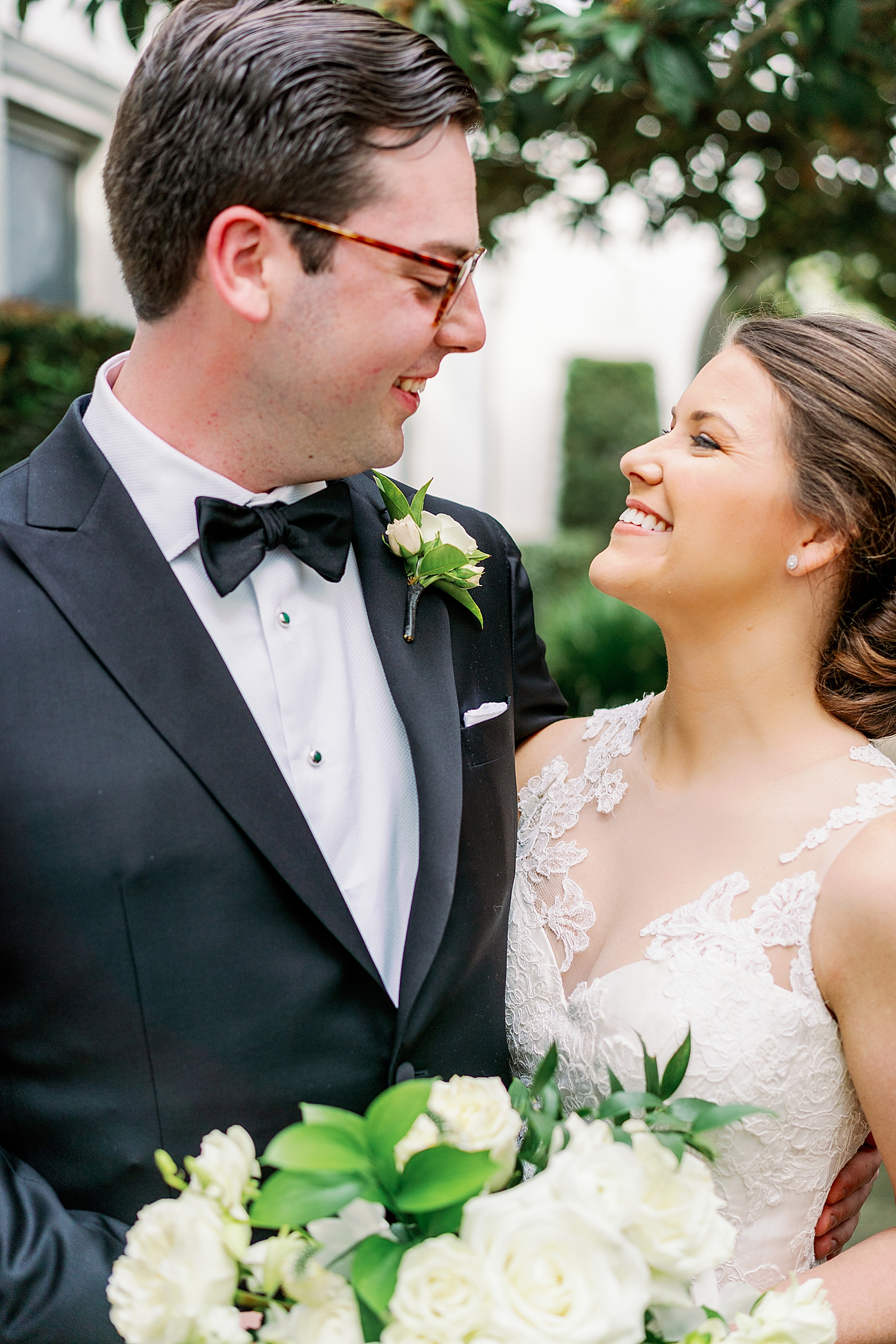 Bride and groom smiling at each other after their first look | Photo by Annie Laura Photography