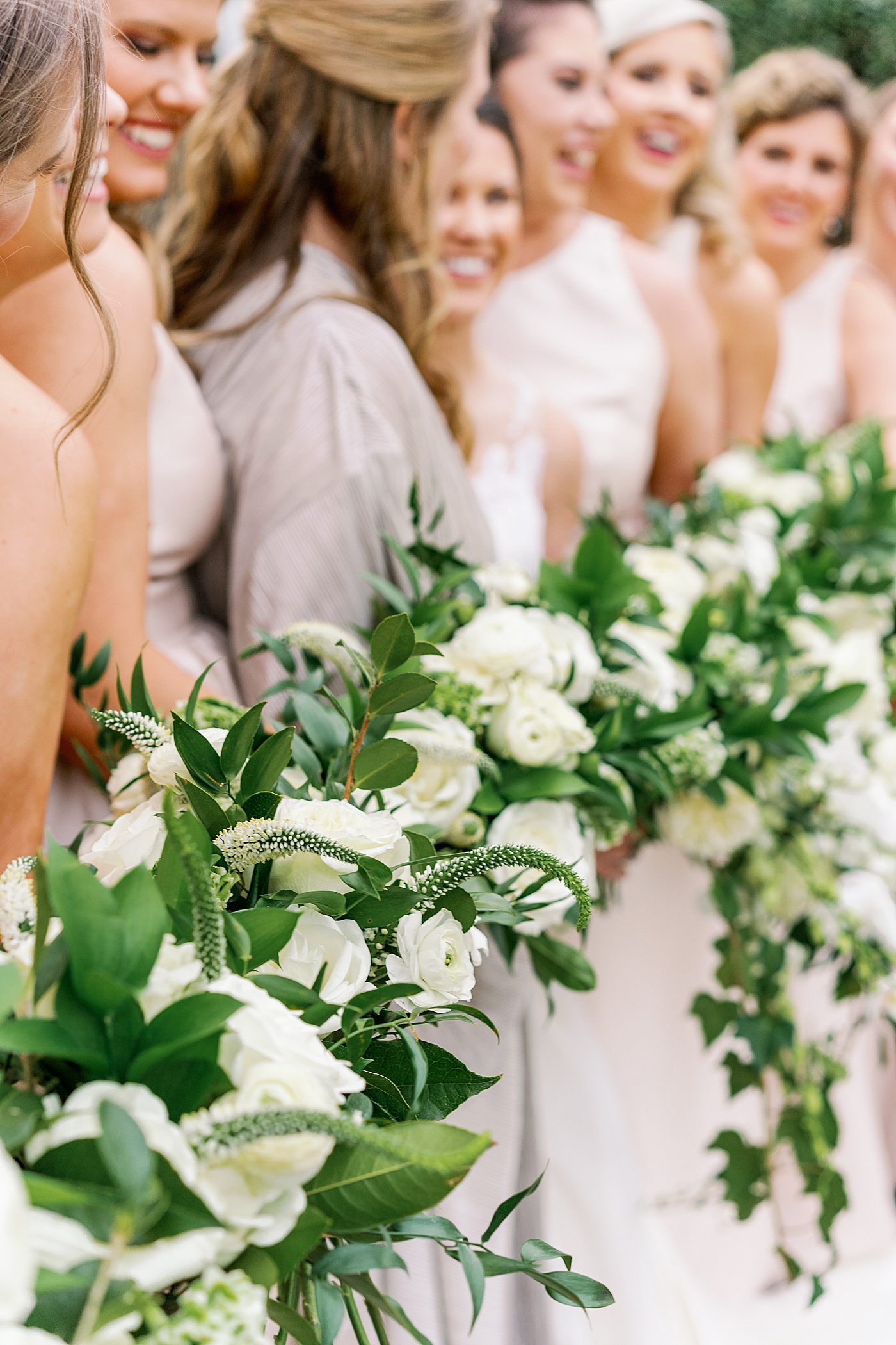 Bridal party flowers during Timeless Country Club Wedding | Photo by Annie Laura Photography
