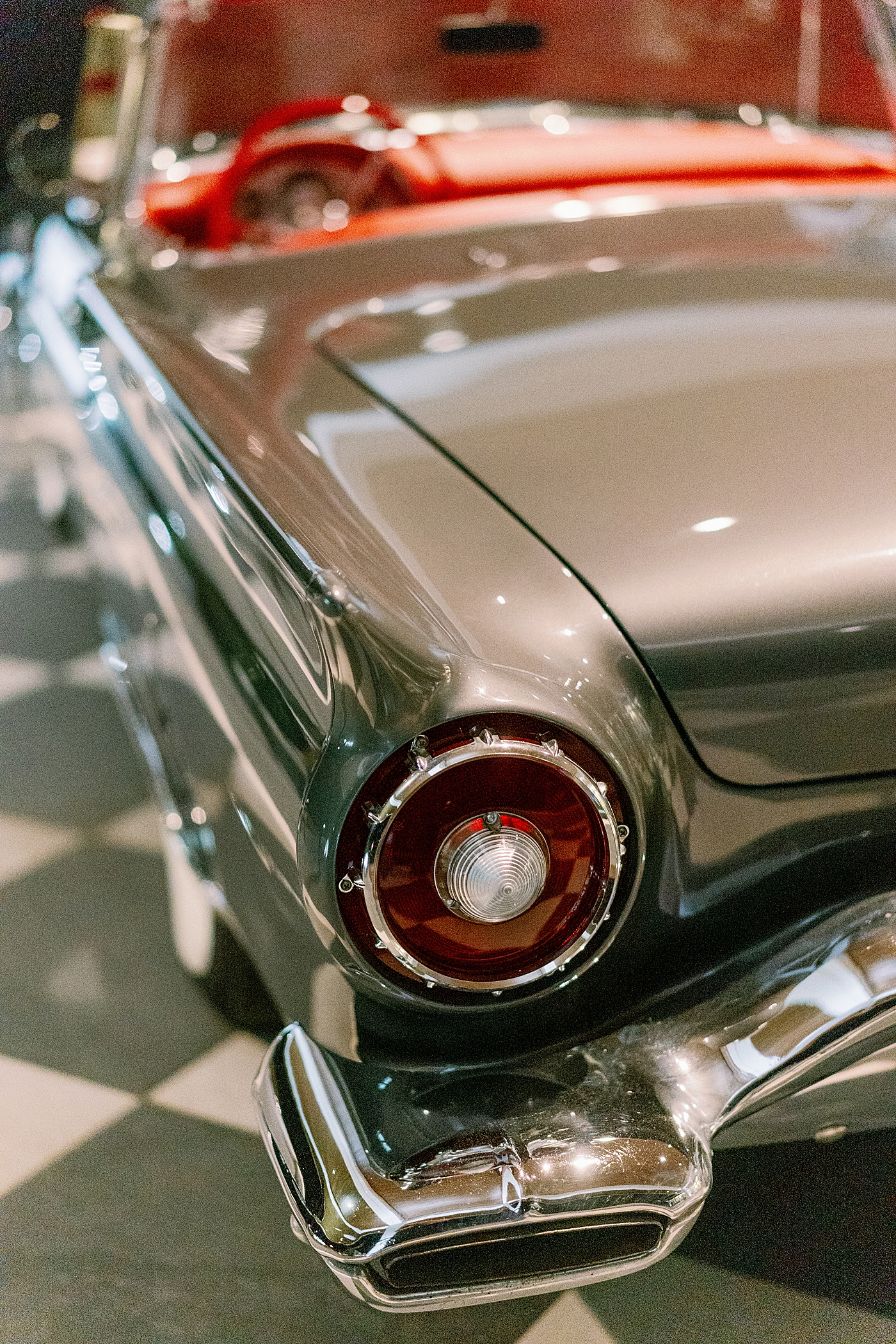 Detail photo of a vintage gray thunderbird | Photo by Annie Laura Photography