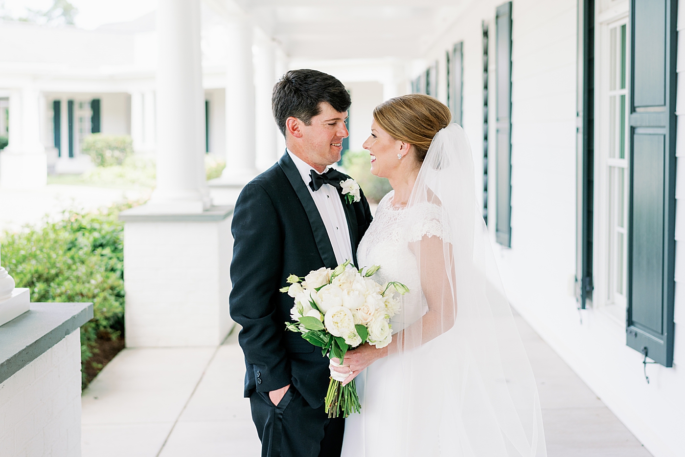 Bride and groom portraits during their Simple Southern Country Club Wedding | Image by Annie Laura Photo