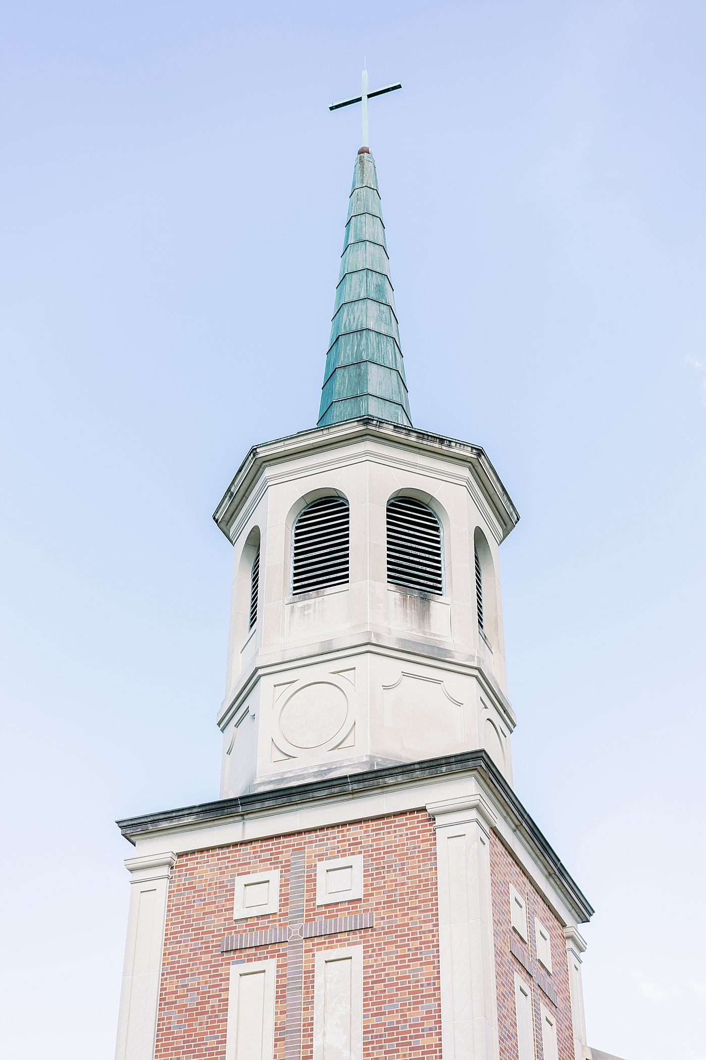 Church steeple with blue and brick | Image by Annie Laura Photo