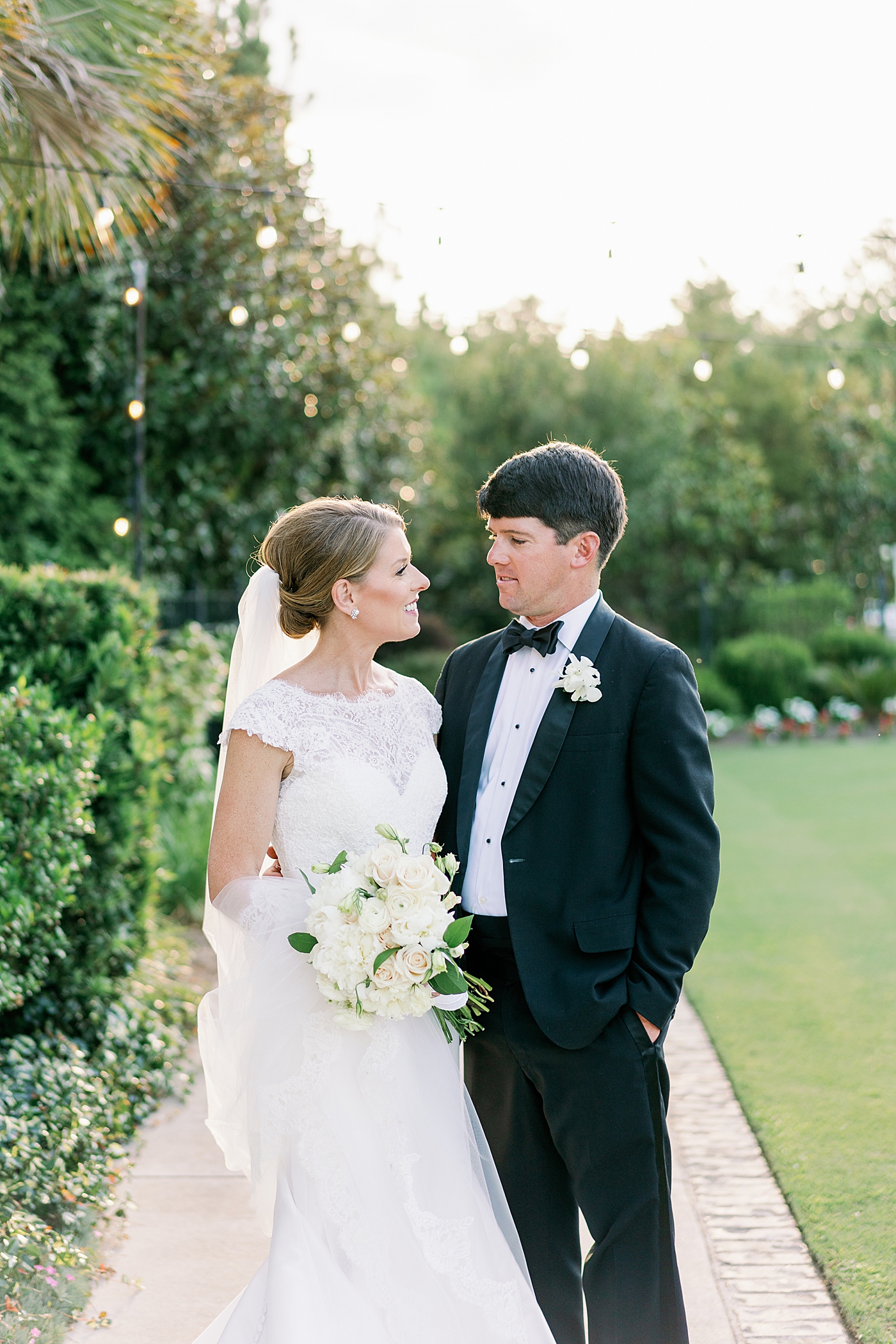 Bride and groom during their Simple Southern Country Club Wedding | Image by Annie Laura Photo