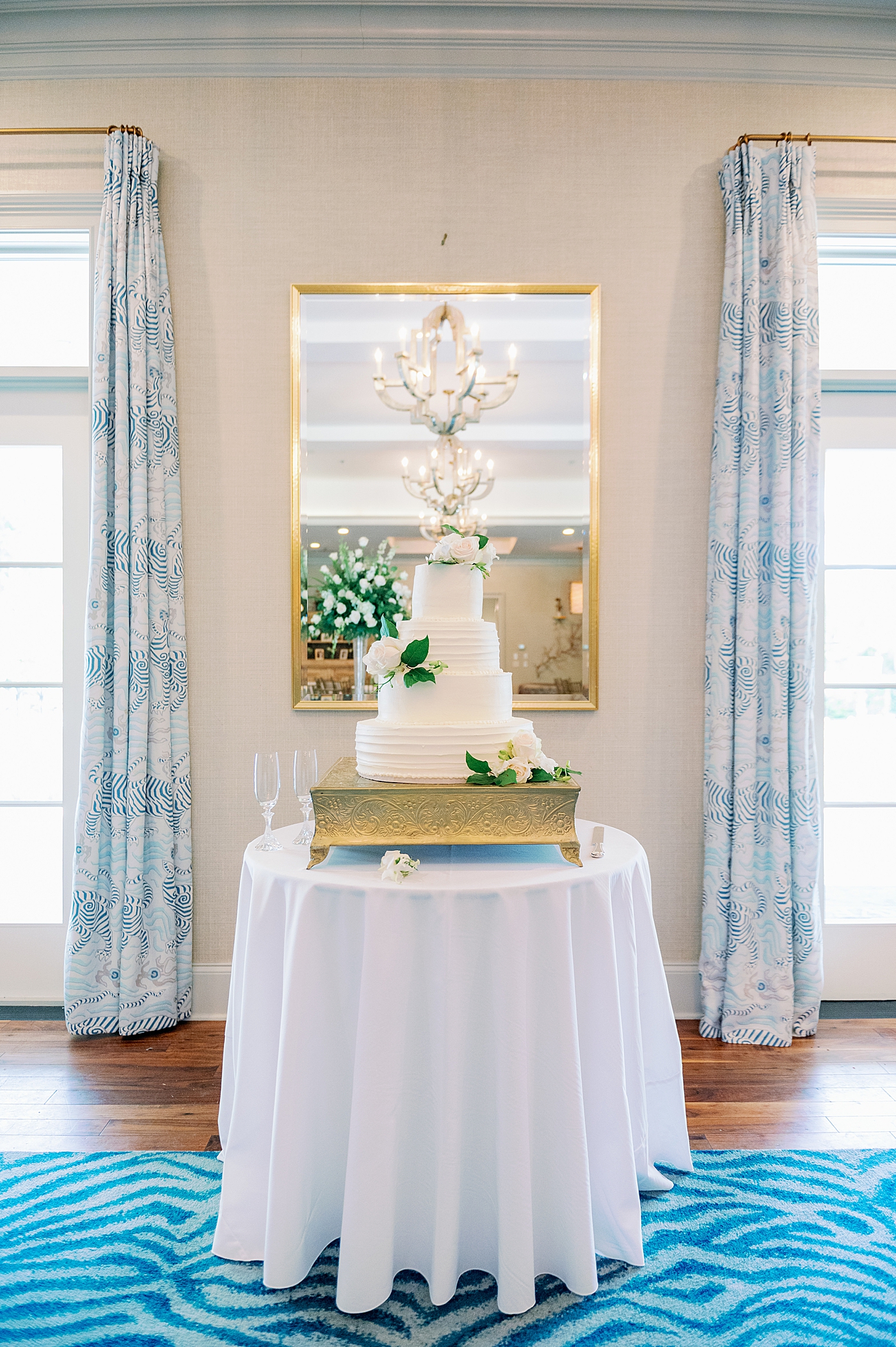 Wedding cake on a white table | Image by Annie Laura Photo