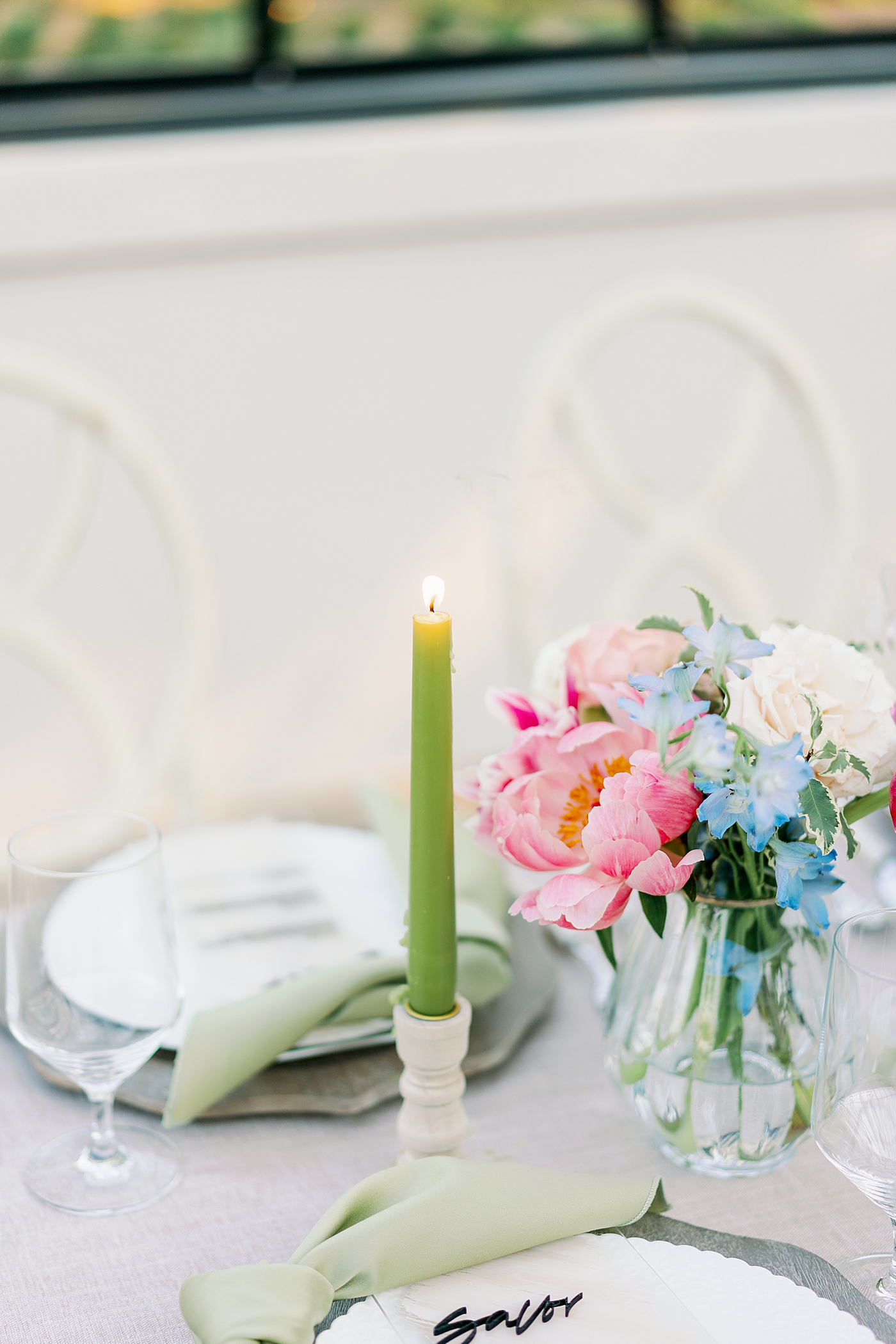 Green pillar candles during summer inspired garden wedding | Photo by Annie Laura Photo