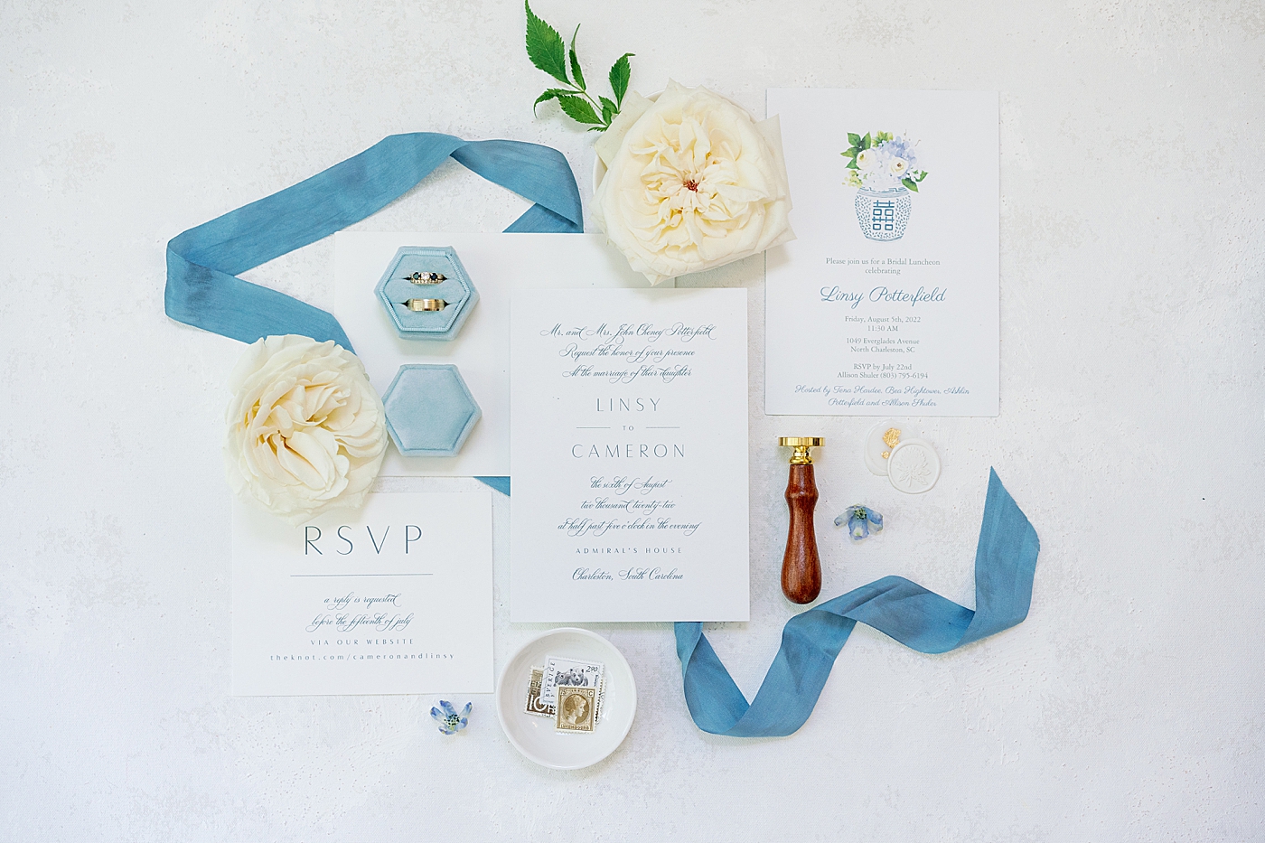 Wedding invitation suite with blue ribbon | Images by Annie Laura Photography