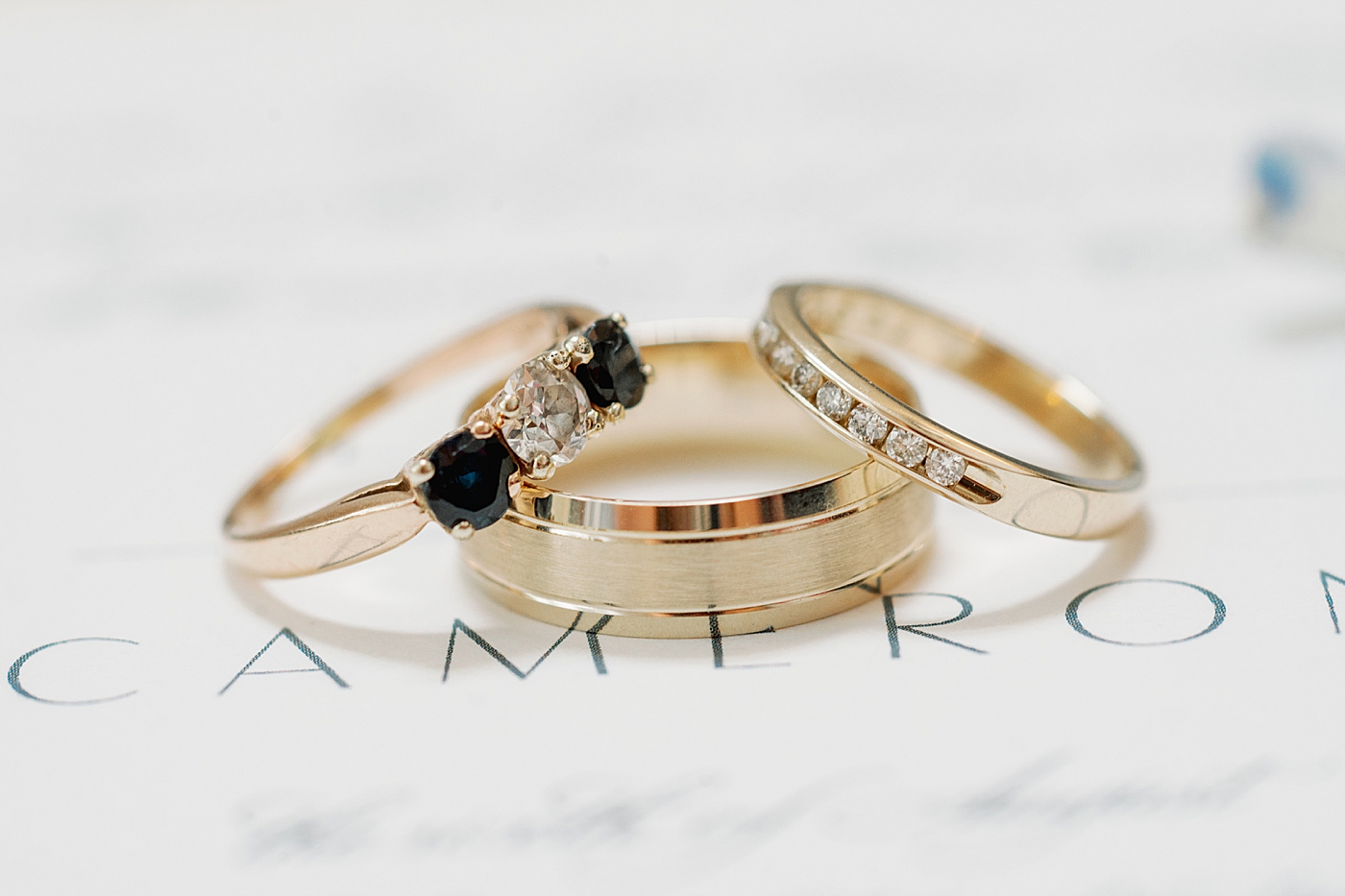 Wedding rings on an invitation | Images by Annie Laura Photography