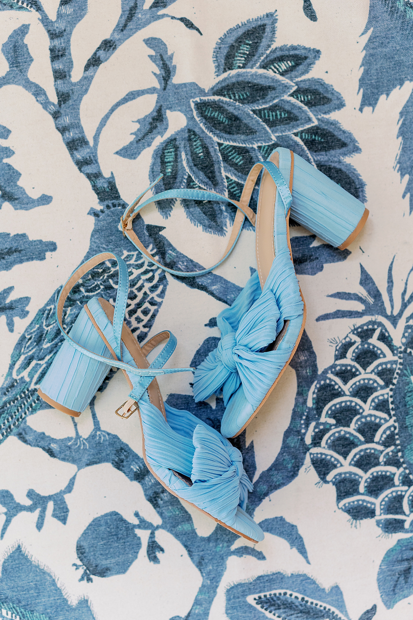 Blue bridal shoes on blue patterned fabric | Images by Annie Laura Photography
