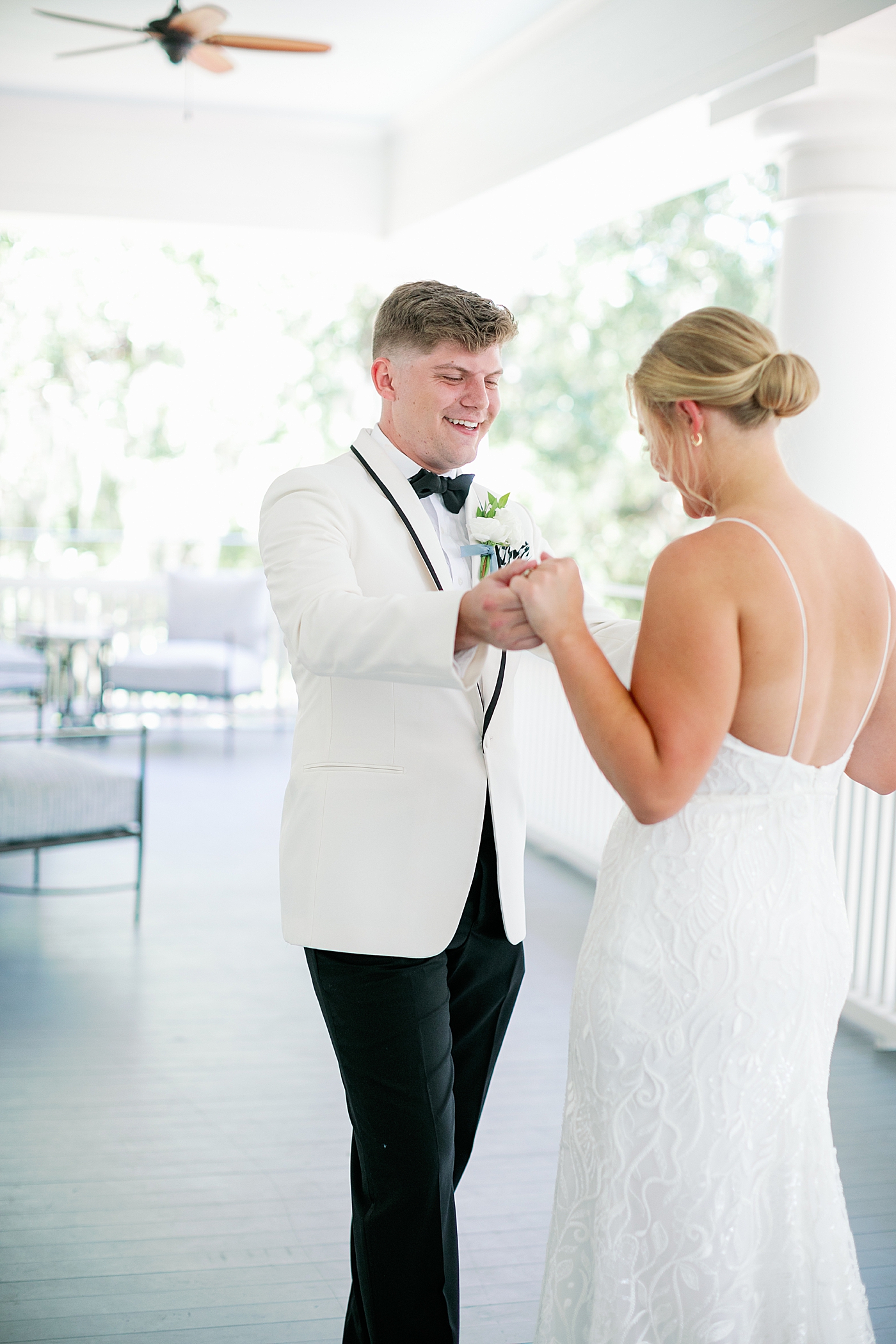 Bride and groom first look on a balcony | Images by Annie Laura Photography
