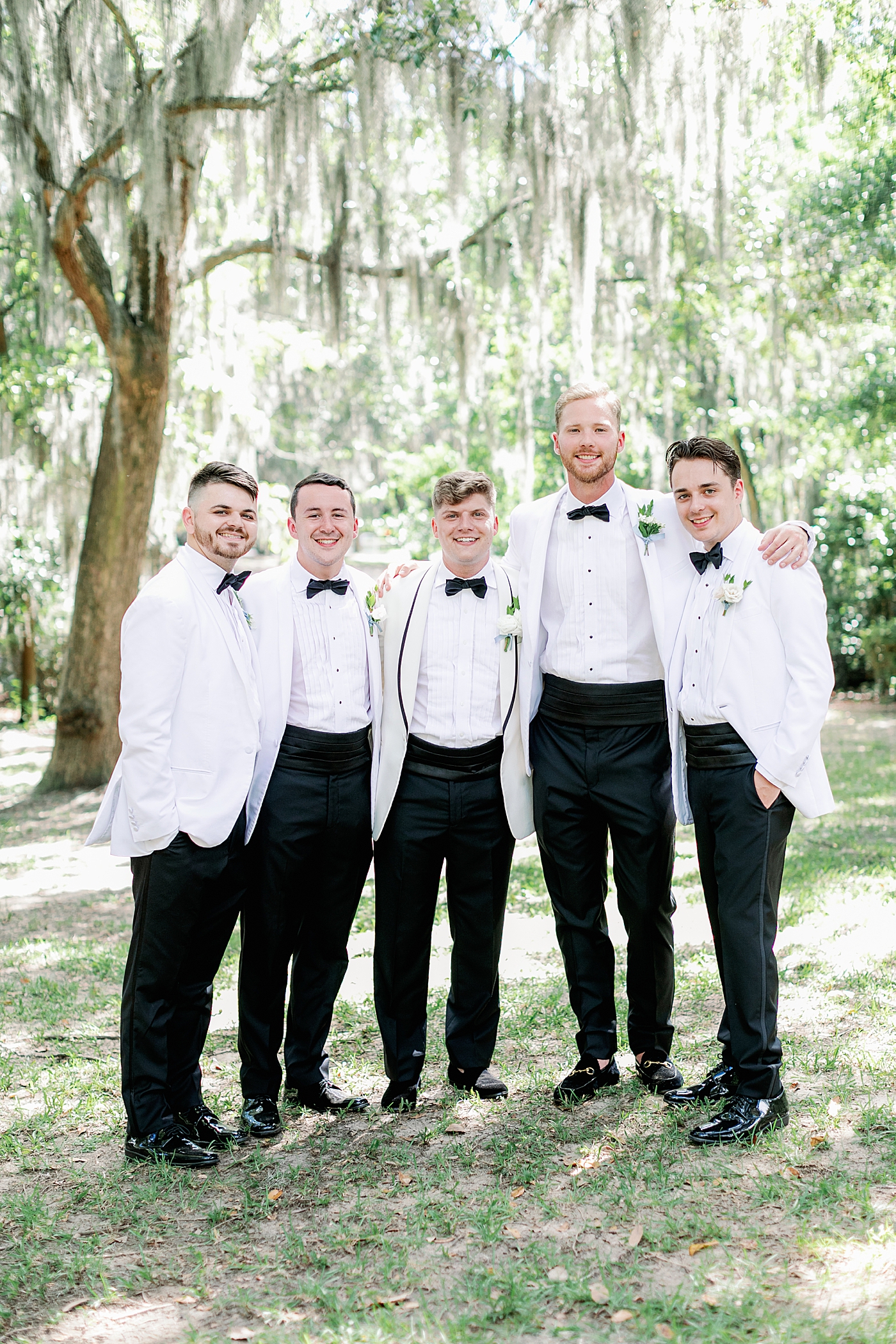Groom with groomsmen during Elegant Grandmillenial Charleston Wedding | Images by Annie Laura Photography