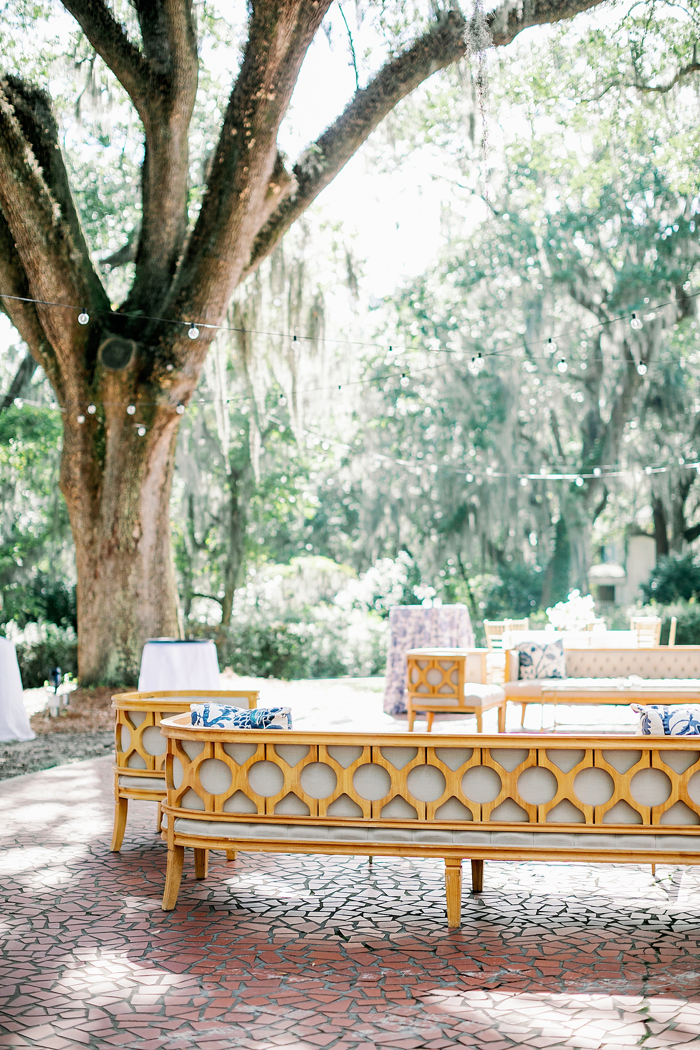 Outdoor seating area during their Elegant Grandmillenial Charleston Wedding | Images by Annie Laura Photography