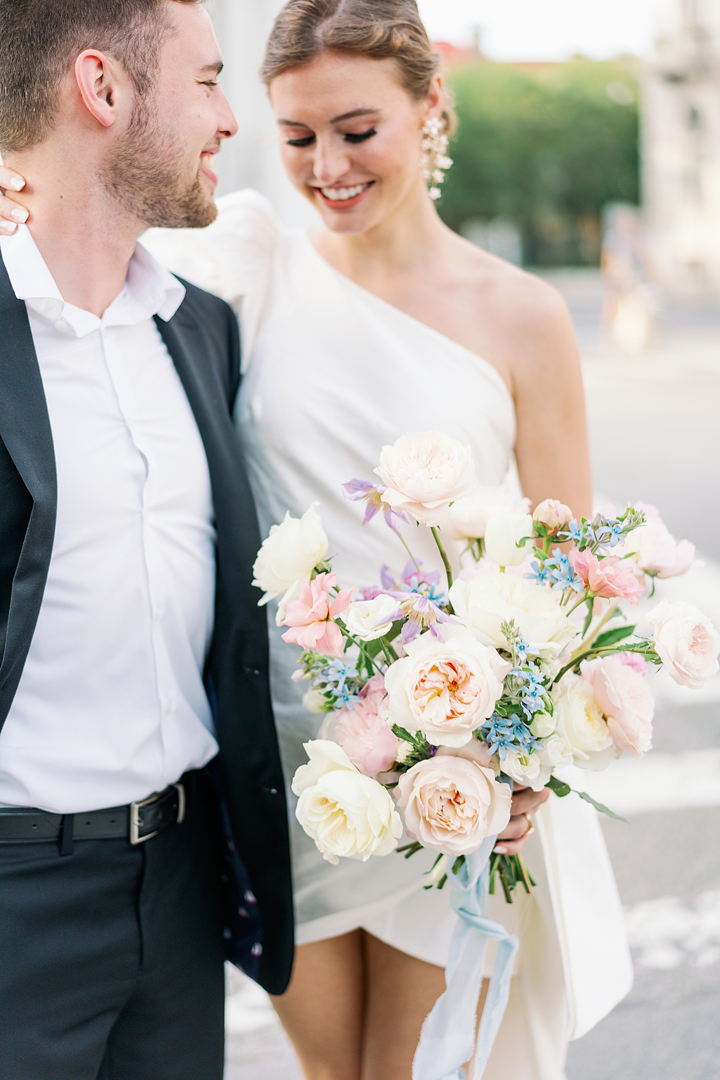 Detail of smiling couple and pastel bouquet | Images by Annie Laura Photo