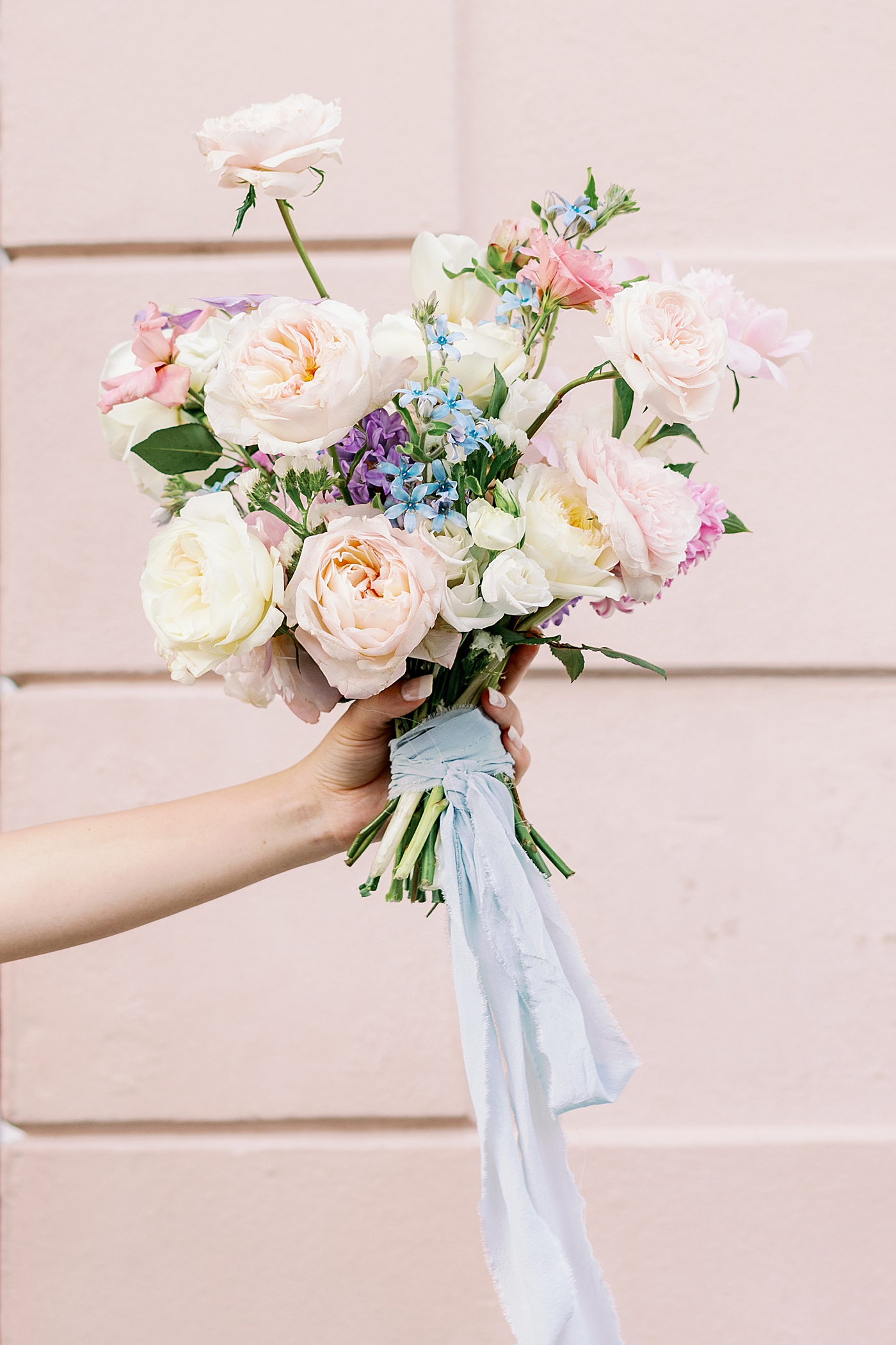 Bridal bouquet with blue silk ribbon during Elevated City Hall Elopement in Charleston | Images by Annie Laura Photo
