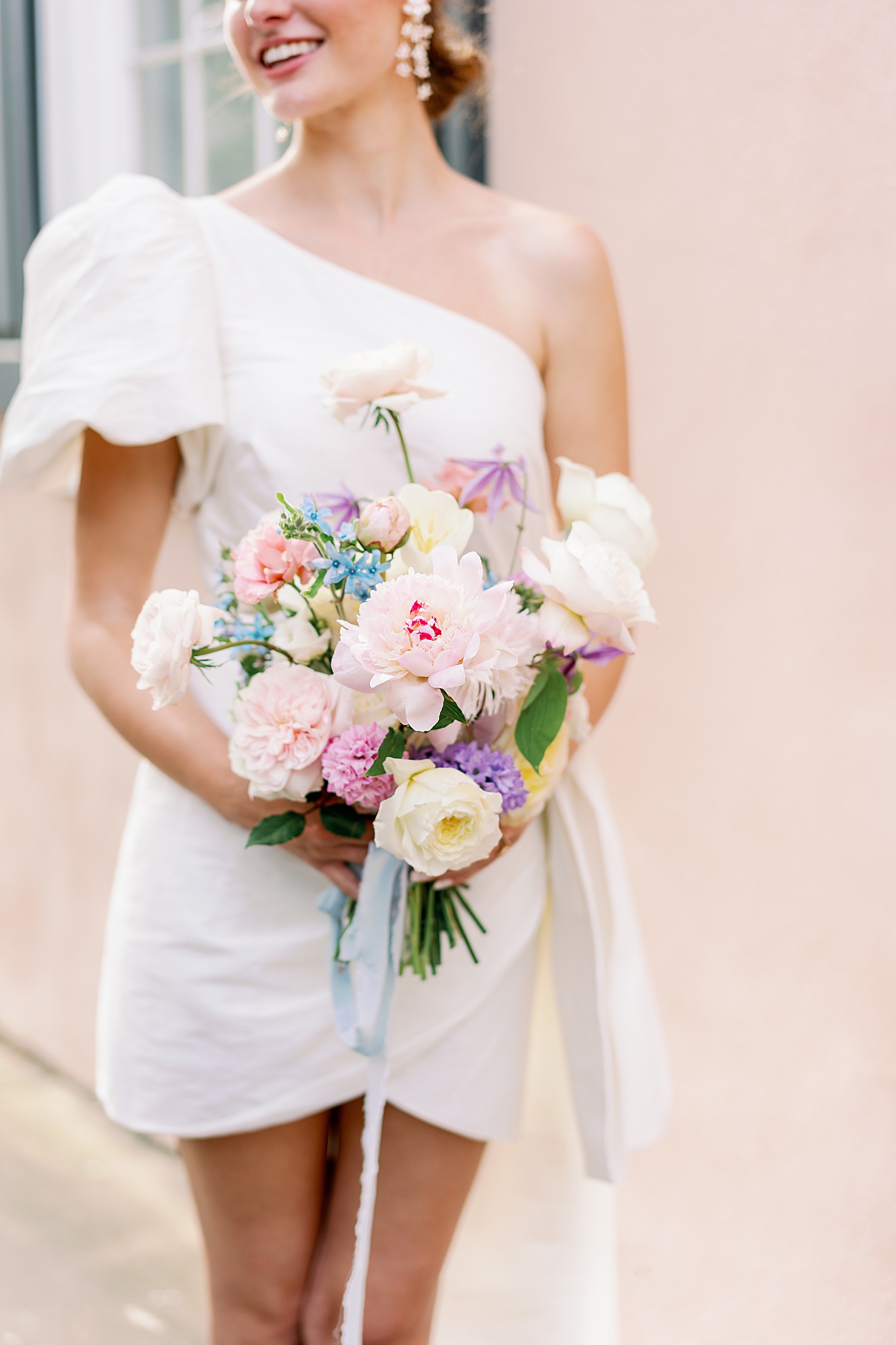Detail of bride holding a bouquet | Images by Annie Laura Photo