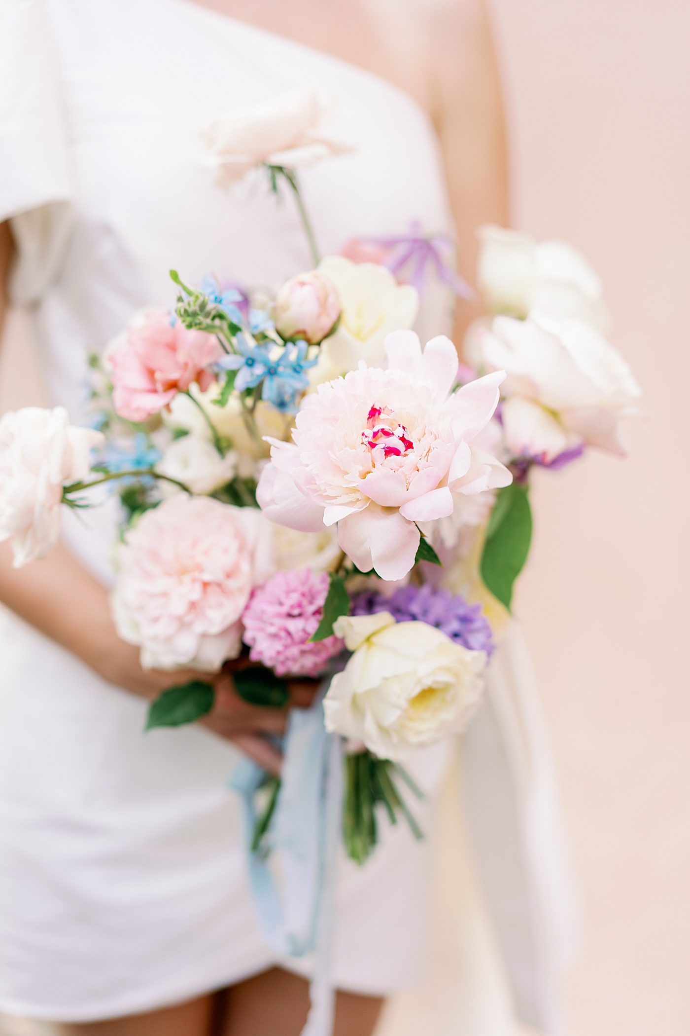 Detail of bridal bouquet held by bride during Elevated City Hall Elopement in Charleston | Images by Annie Laura Photo