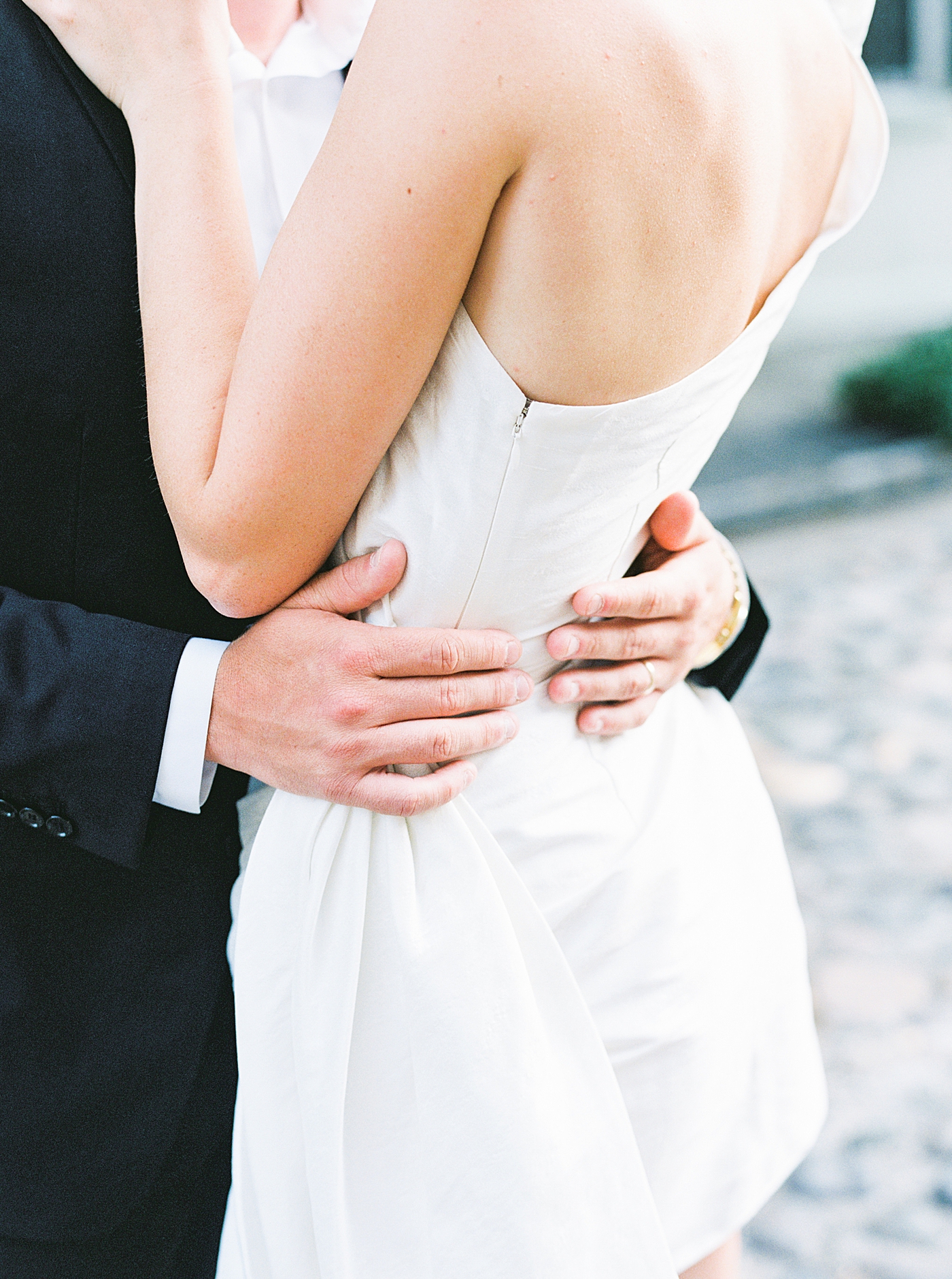 Groom pulling bride in close | Images by Annie Laura Photo