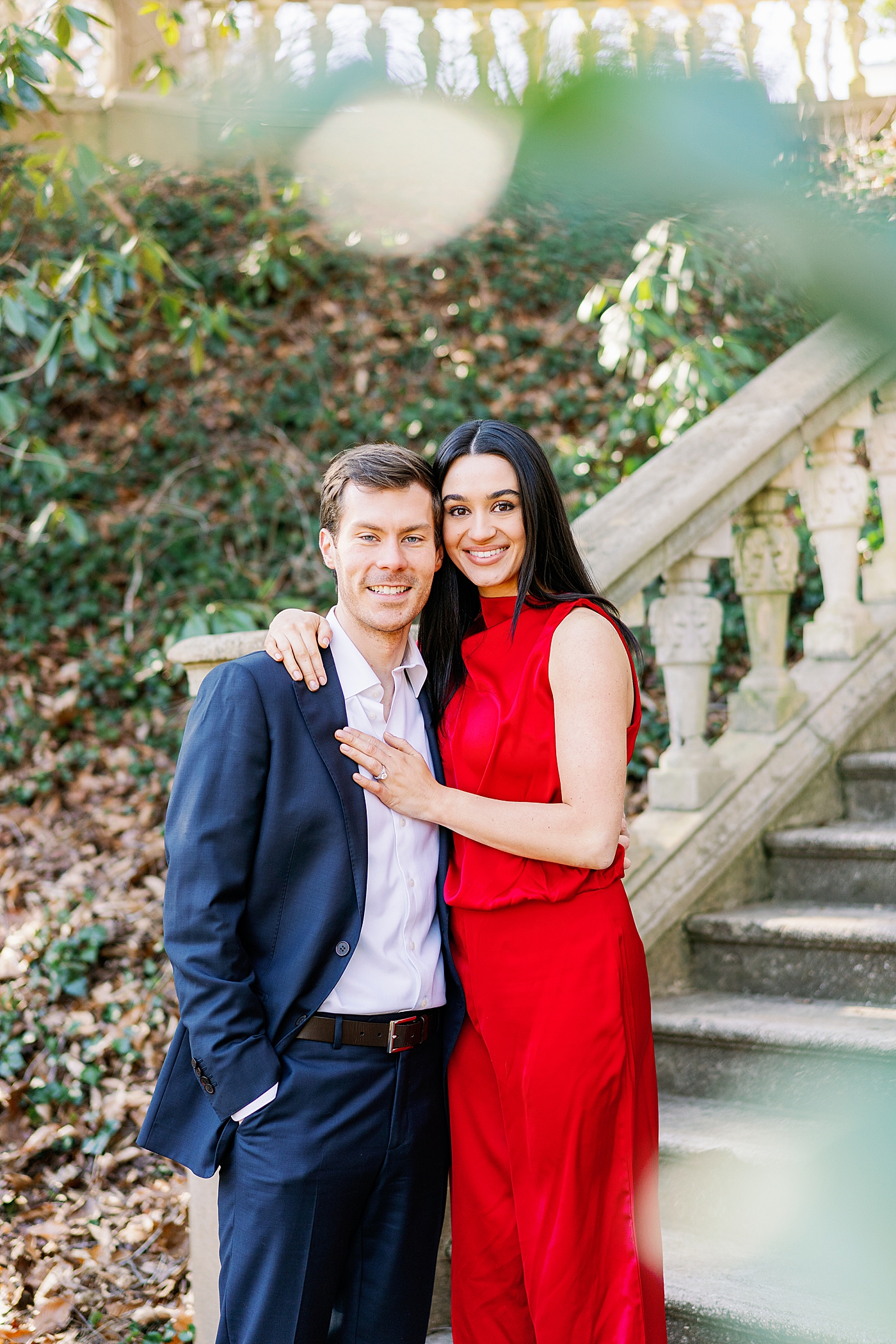 Couple embracing during their Atlanta, GA Garden Engagement | Image by Annie Laura Photo