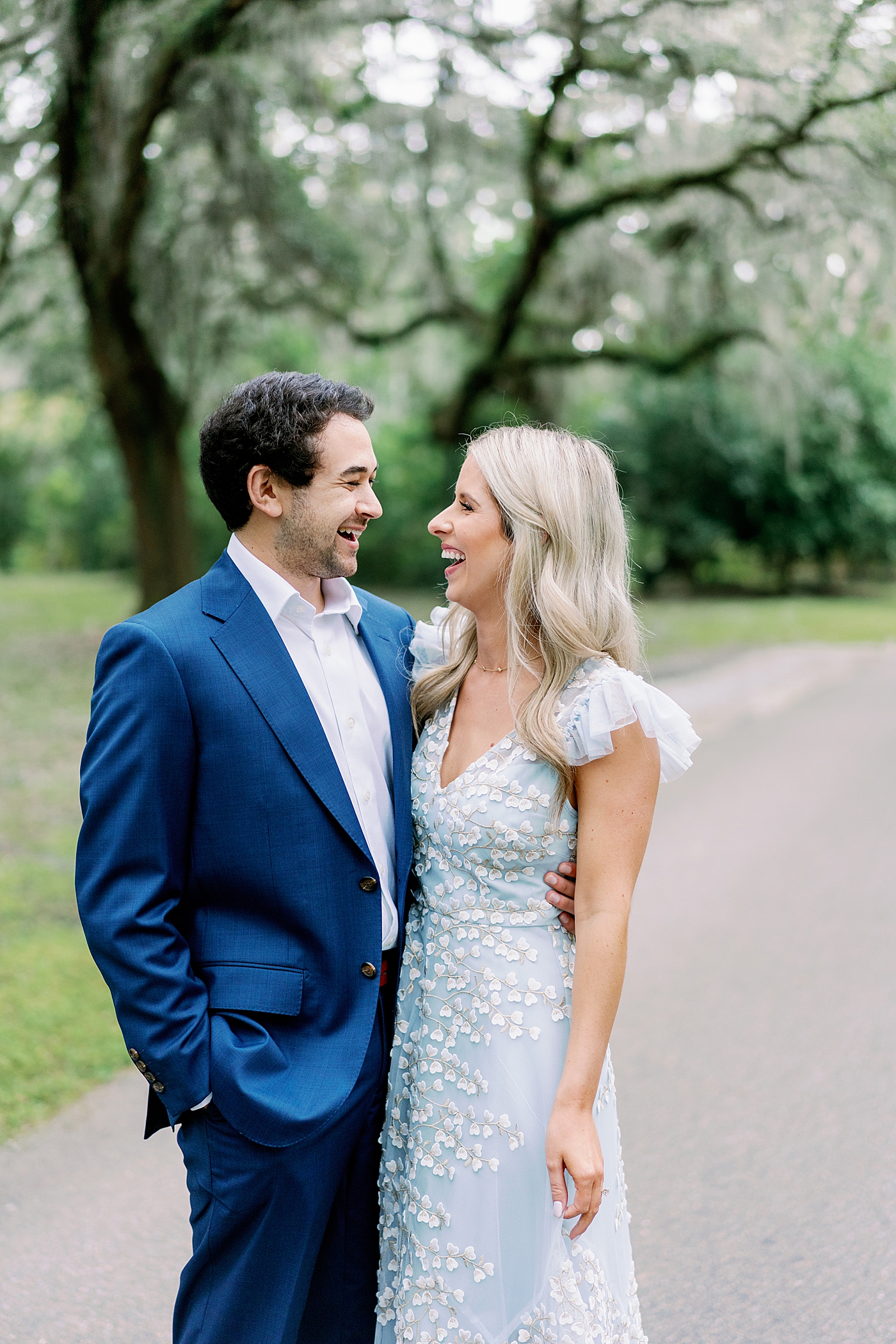 Couple laughing together | Image by Annie Laura Photo