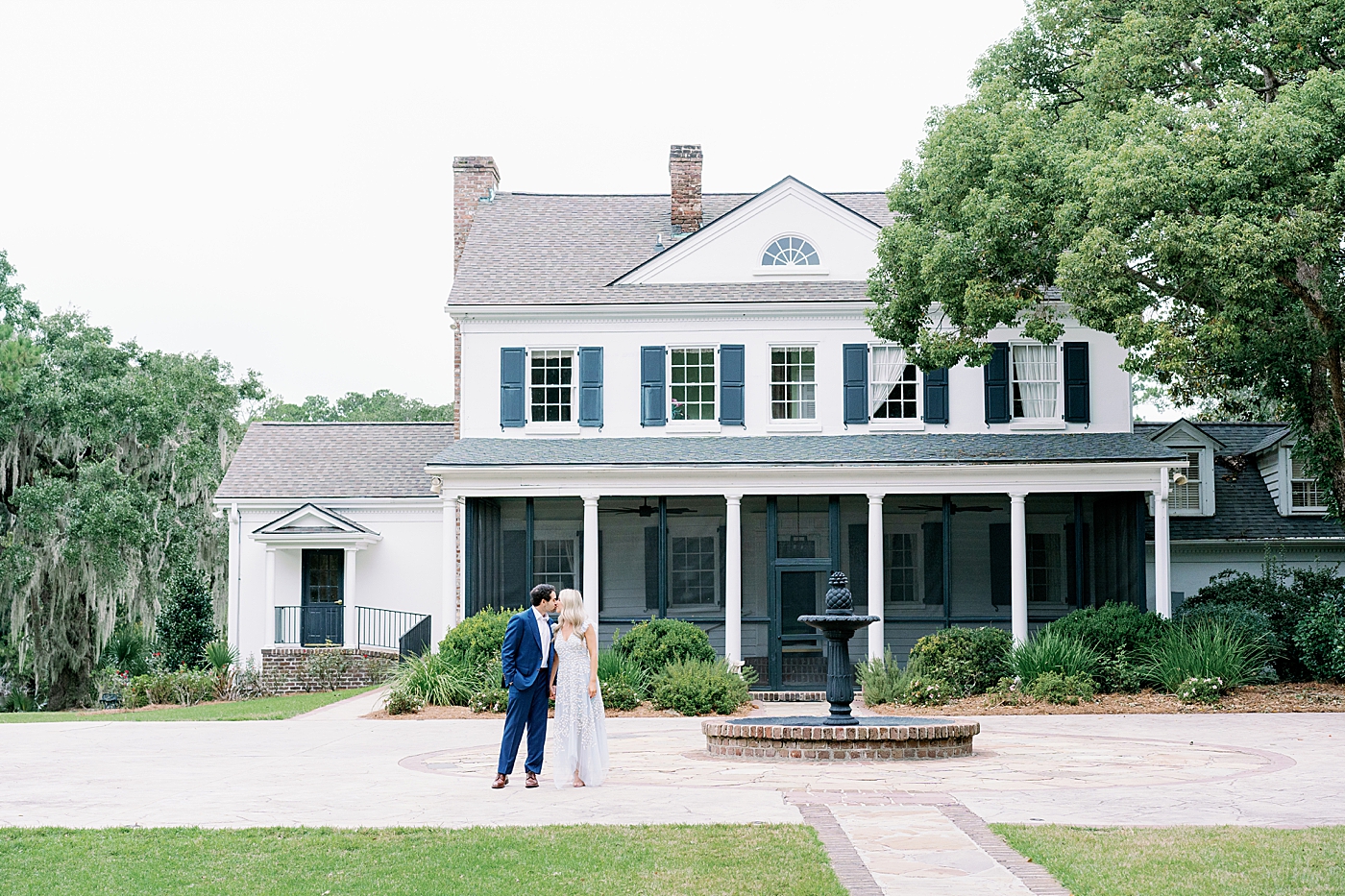 Couple holding hands in front of Legare Waring House | Image by Annie Laura Photo