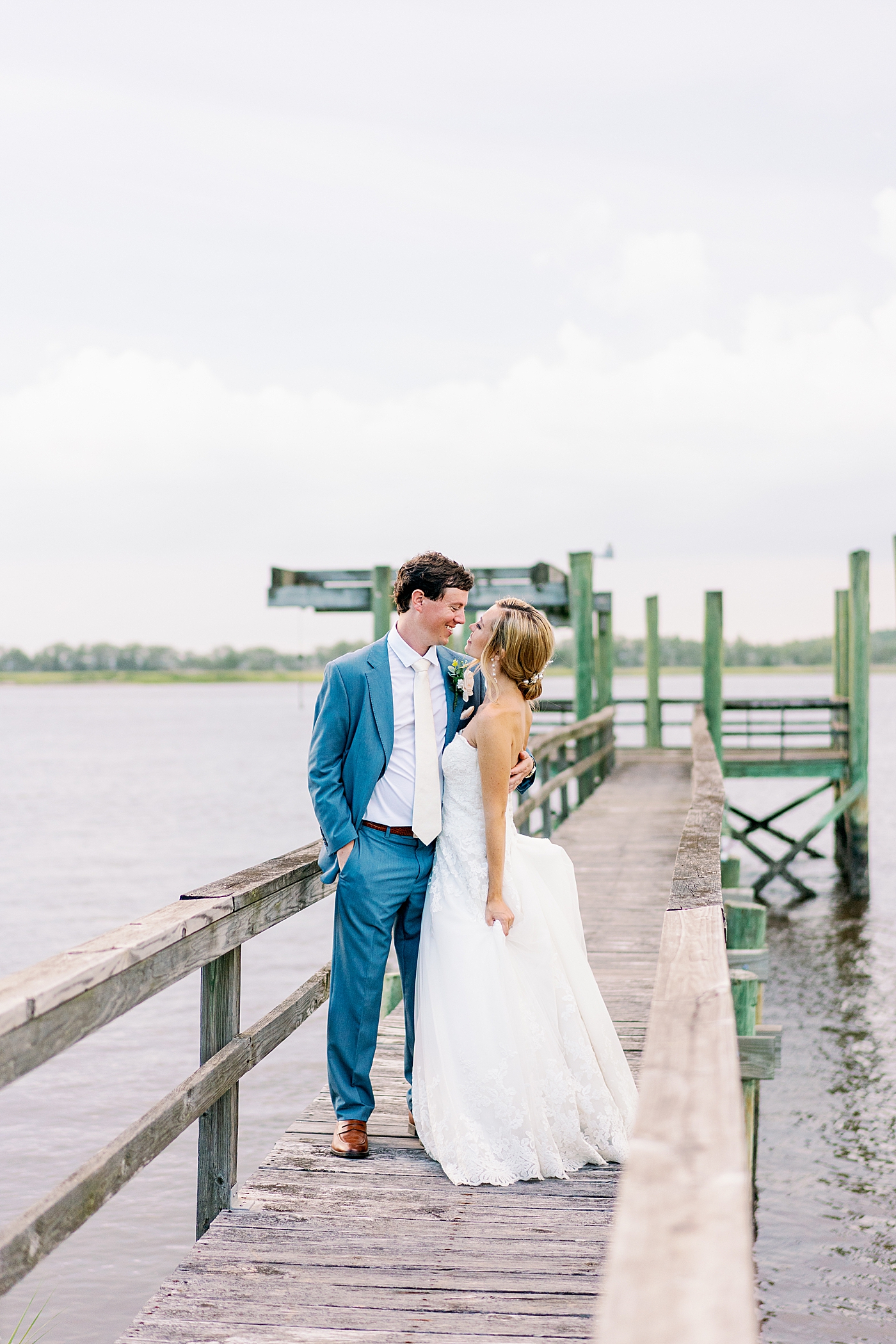 during their Coastal Island House Wedding | Image by Annie Laura Photo